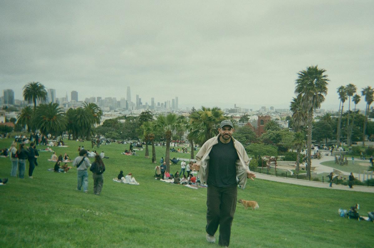 Dolores Park on a clear day, the San Francisco skyline behind it